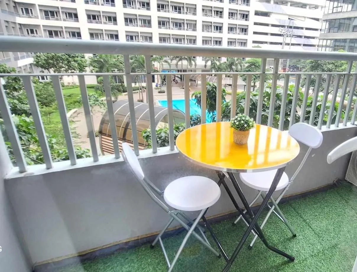 Bright And Cozy 1 Bedroom With Balcony Pool View And Wifi In Grace Residences Manila