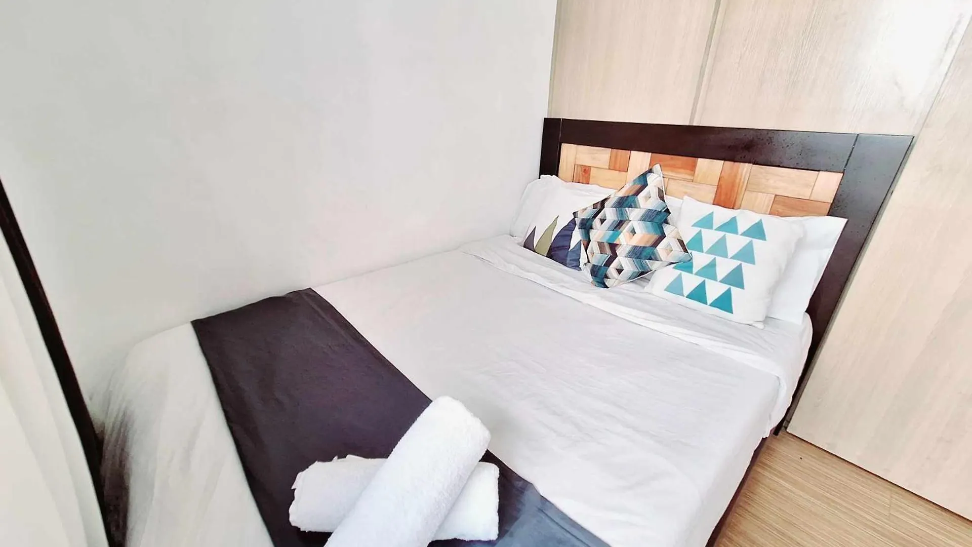 Bright And Cozy 1 Bedroom With Balcony Pool View And Wifi In Grace Residences Manila